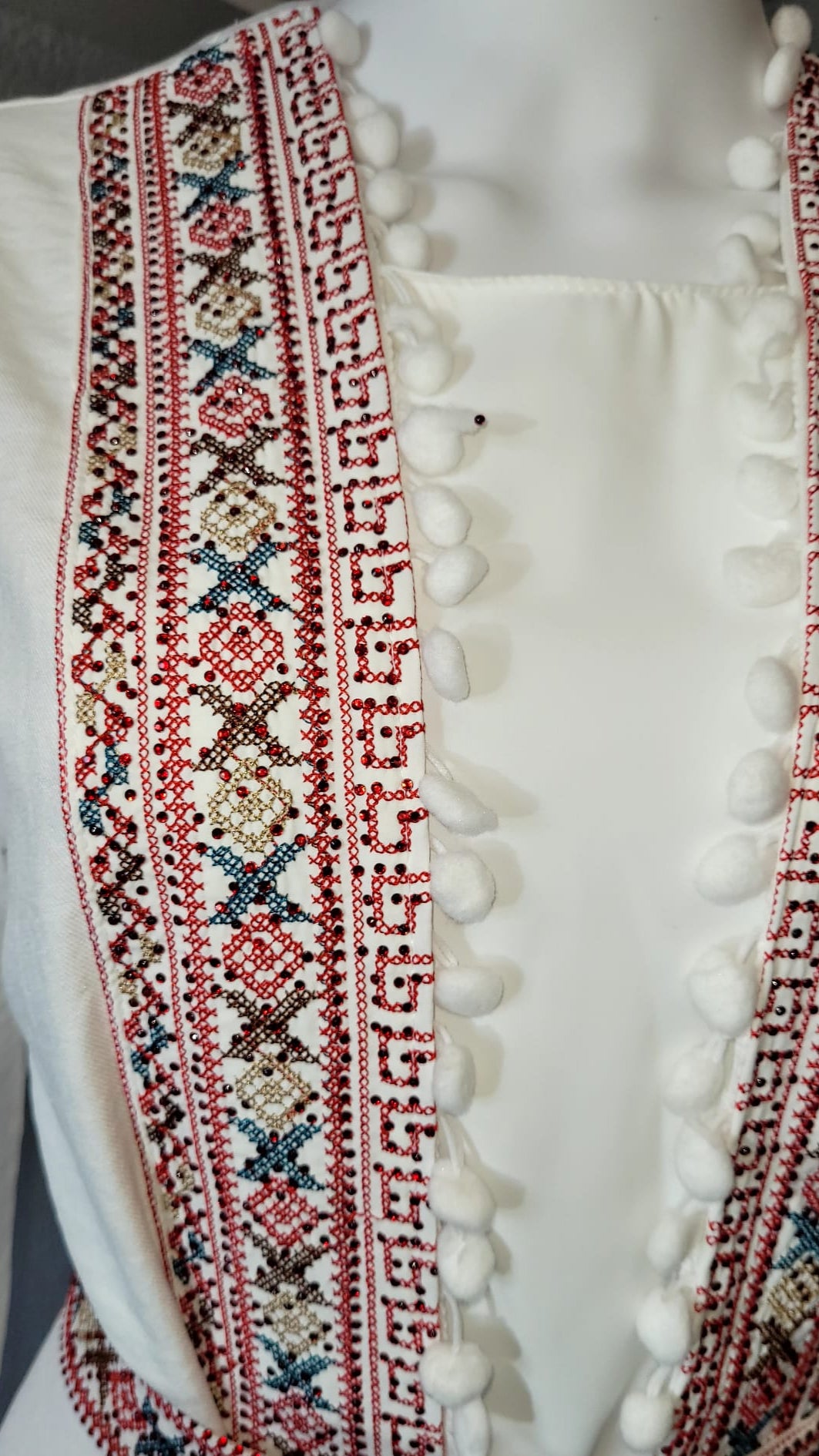 White Kaftan with Intricate Red Designs and Patterns